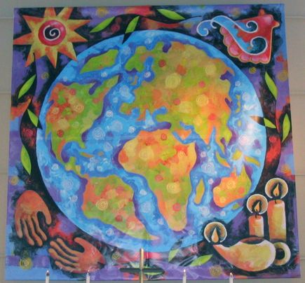 The global mission banner is a colorful drawing of the planet Earth