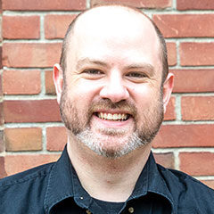 Kris McQuage-Loukas outside University Lutheran Church