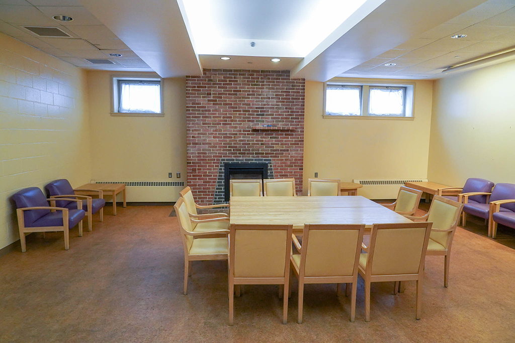 A view of the FIreside Room from the side shows the brick fireplace.